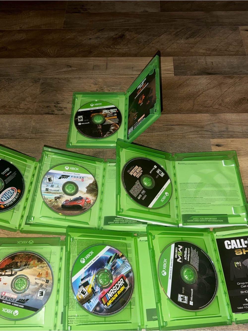 Green Case Assorted Racing & Action Game Bundle - Picture 2 of 2